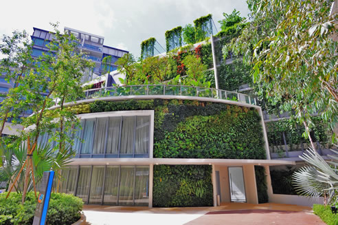 green wall facade at residential complex in singapore
