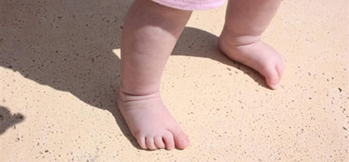 baby feet on pavers