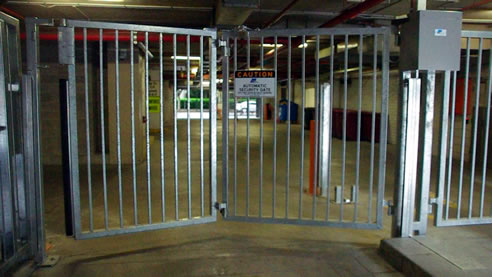 tracless bi-fold security gate