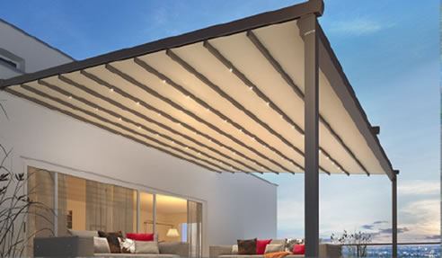 Retractable textile patio roof