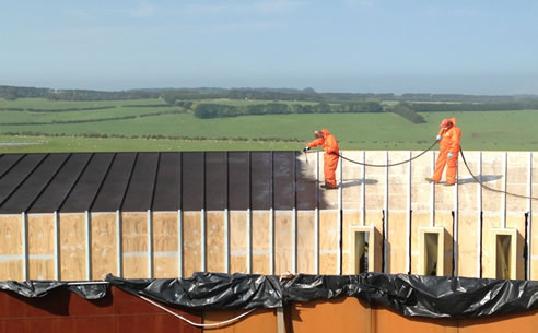 applying elastomeric roof waterproofing