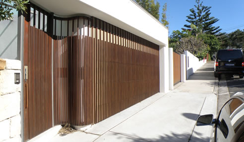 ... Facade View Of Balmoral House In Australia With Wood Garage Door Image Custom Designed Timber Garage Doors from Deville Garage Doors