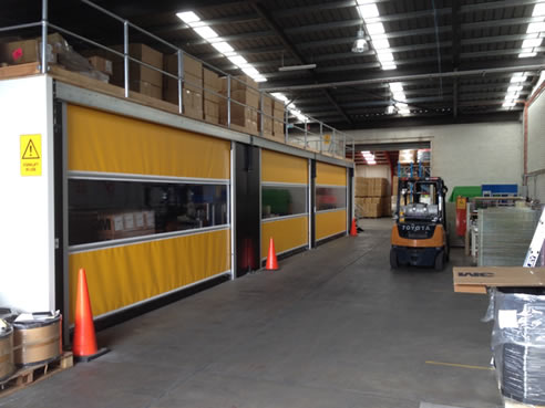 mezzanine enclosed by high speed roll doors