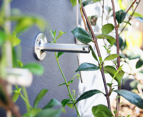 Green wall hardware from Miami Stainless