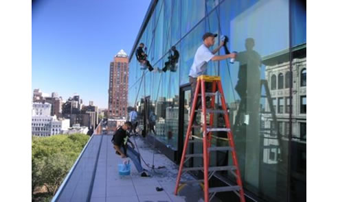 applying glass protection coating to tiffany building