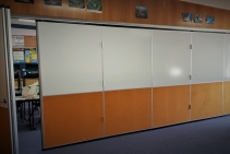 	Operable Wall Partitions with Retractable Floor Seals for Classrooms by Bildspec	