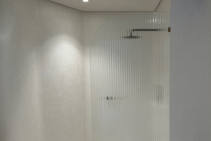 	Textured Glass Shower Screen by Axolotl	