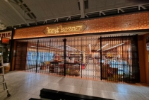 	Folding Security Door for Curved Shopfronts by ATDC	