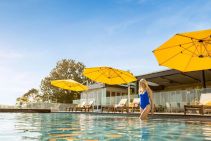 	Rotating Umbrellas for Resorts & Hotel Swimming Pools by Instant Shade Umbrellas	