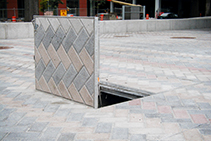 Aluminium Infill Hatches That Blend Into the Pavement by EJ