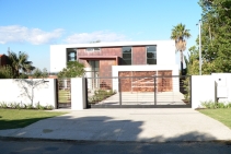 	Custom Pedestrian and Driveway Gate by ALLOY	