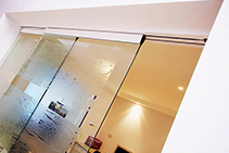Frameless Glass Partition Doors from Smooth Door Systems