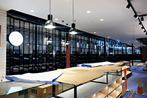 Commercial Folding Closure Doors in Gloss Black from ATDC