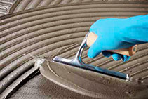 Low VOC Deformable Cementitious Adhesive from MAPEI