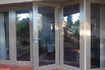 Look for Excellence in Exterior Timber Bifold Doors by Wilkins Windows