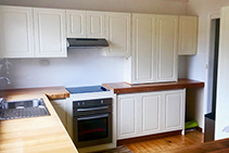 White Acrylic Splashback Over Tiles by Innovative Splashbacks