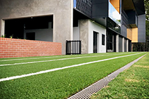 Trench Drains with Anti-Slip Grates for Sports Facilities from ACO