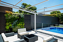 Green Wall & Sandstone Paving for Caulfield Residence by KHD