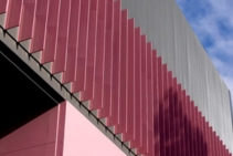 	Dulux Pink Vertical Sun Blades at Docklands Studios in Melbourne by Louvreclad	