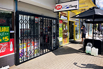 Branded Expandable Security Shutters for IGA by ATDC