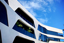 GRC Concrete for Curved Apartment Facade by CHAD