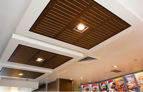 acoustic ceiling panels with timber grain finish