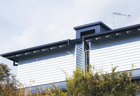 inex weatherboard clad house