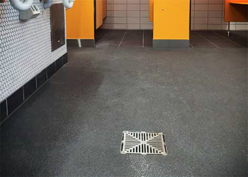 The ACO Wexel range of vertical floor drains with stainless steel hinged Heelguard square grates