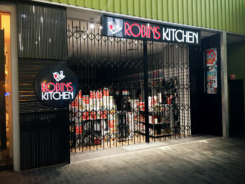 Concertina security doors across the Global Retail Brands portfolio of Robin's Kitchen from Trellis Door Co