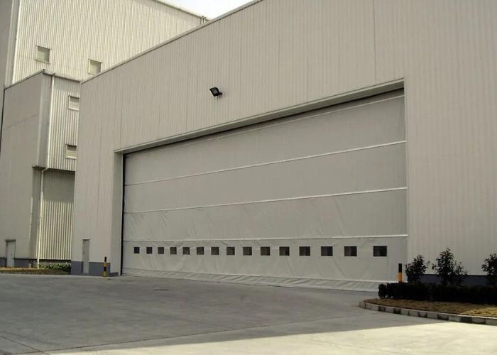 Large Fold Up Doors for Industrial Projects by DMF International