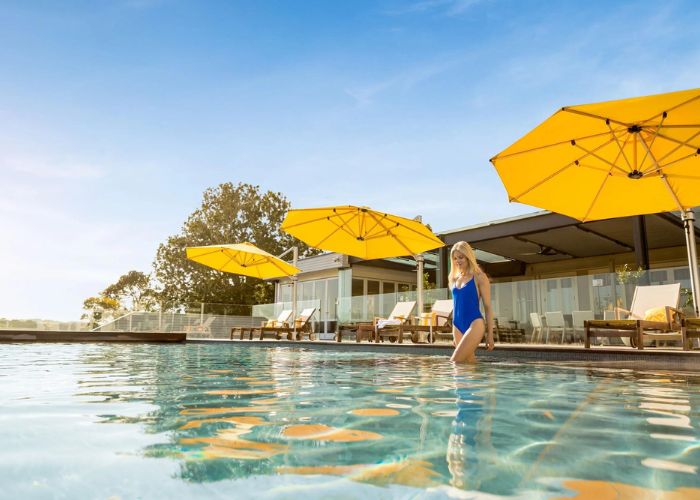 Rotating Umbrellas for Resorts & Hotel Swimming Pools by Instant Shade Umbrellas