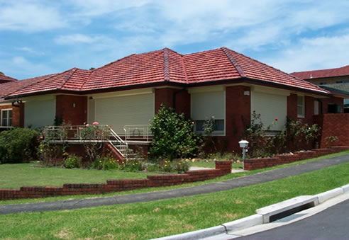 house fitted with roller shutters