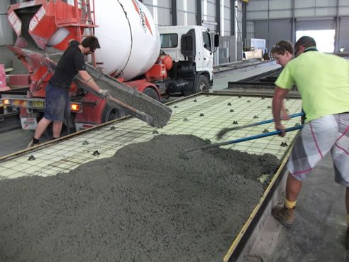 pouring concrete for insulated panels