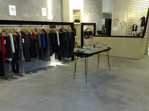 polished concrete floor and walls in shop