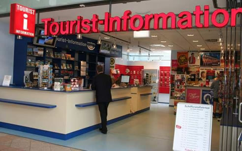 brochure stands at tourist counter