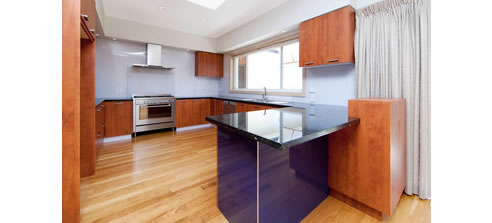 kitchen with high gloss splashback