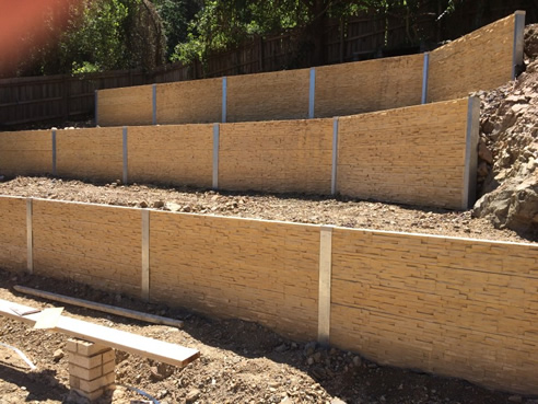 stack stone precast concrete sleeper retaining wall