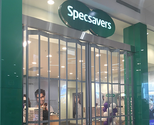 Commercial Concertina Shutters for Specsavers from Trellis Door Co