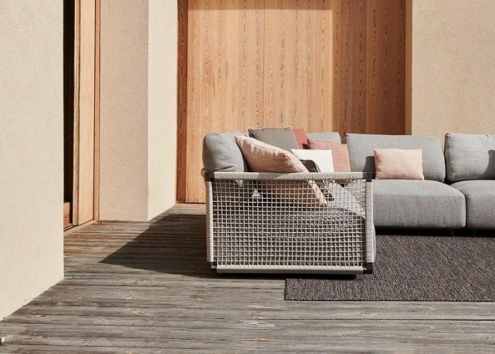 Next-generation comfort featuring Tribu NODI outdoor sofa.