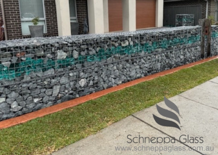 Gabion Fence with Landscaping Glass Feature by Schneppa Glasss