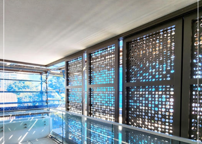 Sliding Punched Aluminium Screens by Maxim Louvres