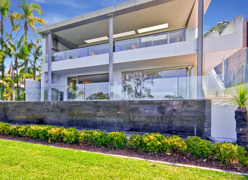 house fitted with multi-stack glass doors