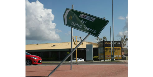 bent road sign after cyclone yasi