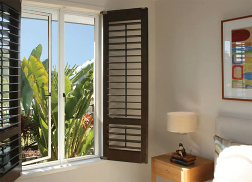 aluminium casement window with louvre shutters