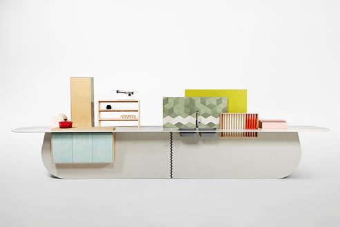 cabinetry and appliances are slotted into purpose-built voids in caesarstone