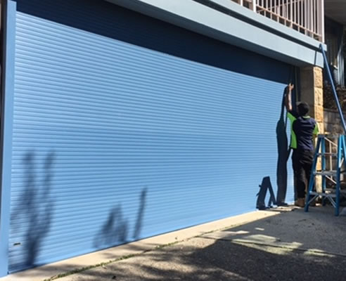 blue powder coated garage door