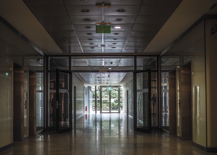 Fully Glazed Automatic Sliding Fire Doors for Residential and Commercial Use by Holland Fire Doors