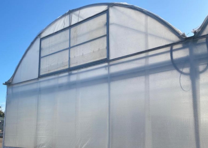 Fabric Cover for Greenhouses by The Nolan Group