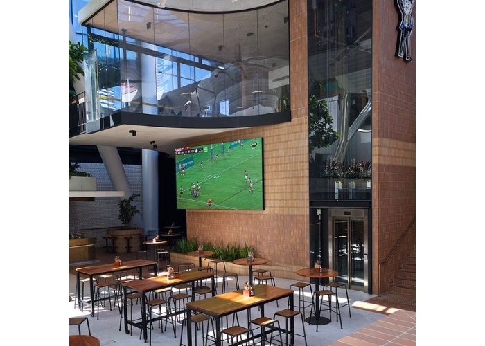 Curved Glass Feature for Sports Bar by Bent & Curved Glass