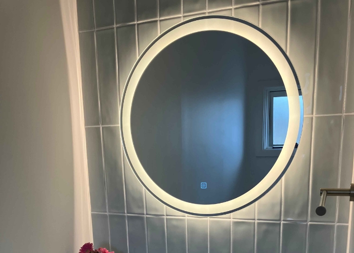 Round LED Mirror for Bathrooms by Tilo Tapware